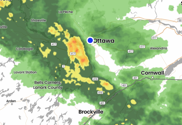 A line of storms is shown on weather radar, approaching ottawa in a big blob of yellow and red, coming up from the lower right (southwest)