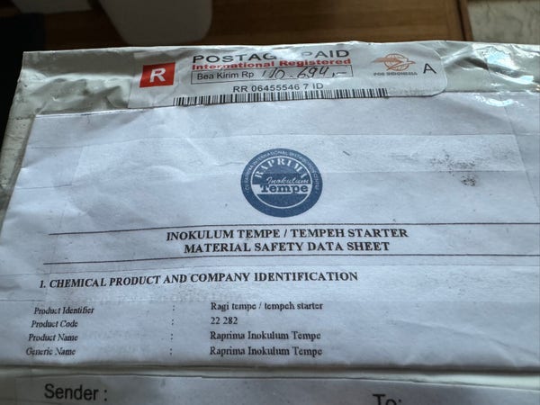 An official looking package with an Indonesian post code and a tempeh starter MSDS