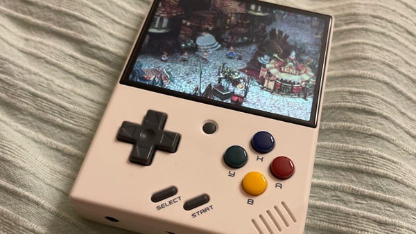 A Miyoo Mini Plus which looks a lot like an original GameBoy (DMG) with a few more buttons and a much, much better screen.