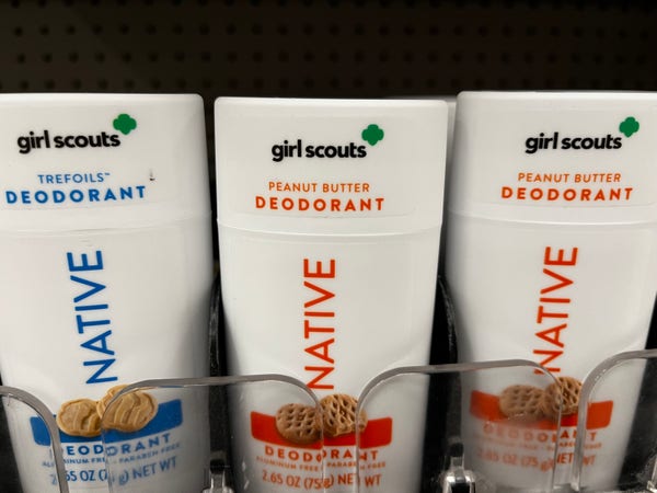 Deodorant with Girl Scout cookie themed scents of Peanut Butter and Trefoils. 