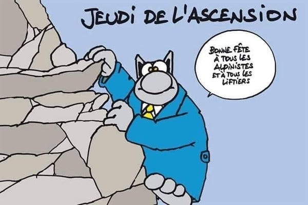 Illustration d'un chat de bande dessinée escaladant une paroi rocheuse avec le texte "Jeudi de L'Ascension" et une bulle disant "Bonne fête à tous les alpinistes et à tous les liftiers".
