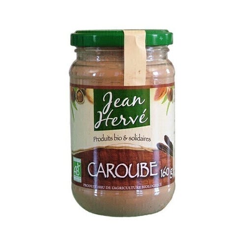 Jar of « Caroube » powder of « Jean Hervé » brand with « Produits bio & solidaire » punchline, 160g (enough for several months, drinking it daily: one coffee spoon per cup of hot water do the job)
