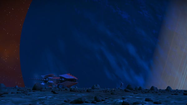Standing on a desolate moon looking at the ringed planet.