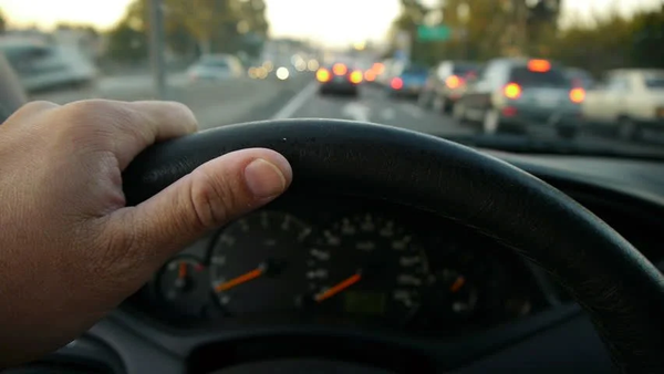 a driver's thumb stuck in freeway traffic doing zero mph, not my picture but I've been there