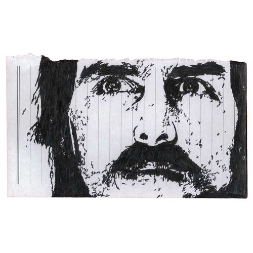 Pen drawing of Tom Cruise with long hair and  mustache looking sad drawn on a torn-out notebook page.