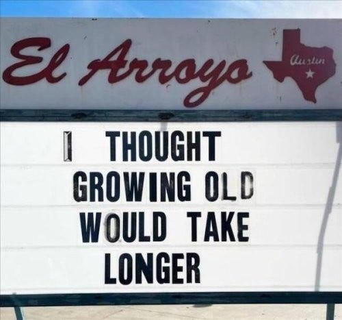 A sign saying "I thought growing old would take longer"