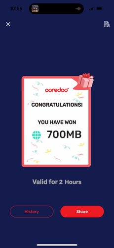 A promotional message on a smartphone screen saying "Congratulations! You have won 700MB" from Ooredoo, with a validity of 2 hours. There are buttons for 'History' and 'Share' below the message.